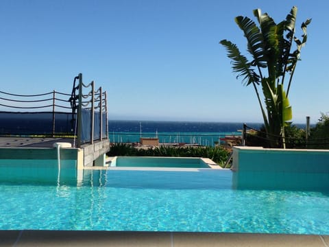 Chateau Vallaya pool & the  Mediterranean
