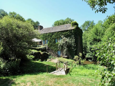 The mill viewed from the swimming pool, with the river to the right