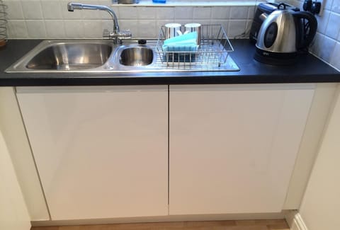 Sink with integrated washing machine.