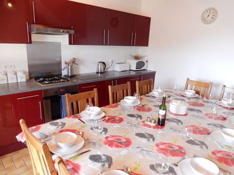 Spacious well-equipped kitchen seating 10. Perfect for relaxing with friends