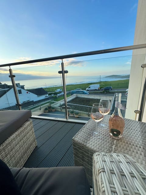 Relax with a drink on the furnished balcony