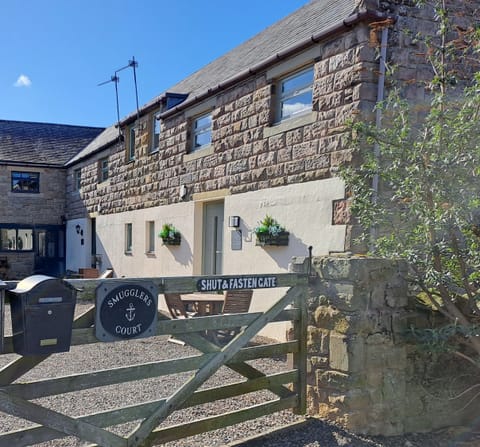The courtyard is shared with the other houses in Smugglers Court