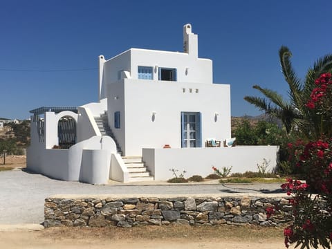 The front of the villa showing steps leading to the upper terrace 
