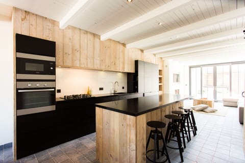 Large kitchen equipped with all modern cooking conveniences