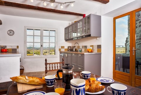 Fully equipped kitchen which leads onto the south facing terrace