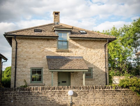 The front of the cottage, with adjacent parking