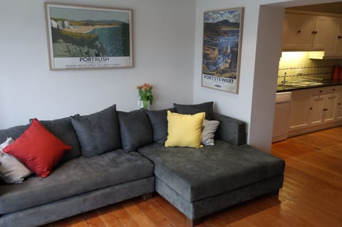 Stretch out on the corner sofa and enjoy a dvd on the flat-screen tv.