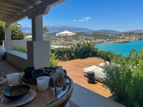 Scenic balcony with panoramic sea and hillside views