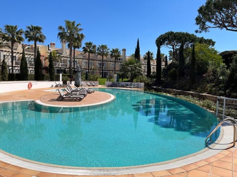 Property backing onto 1 of 4 pools available at Palmyra