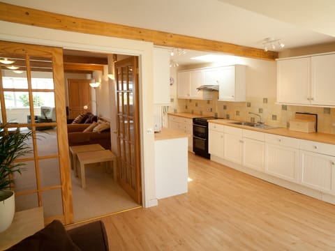 View from the Open Plan Sitting Room Adjoining Kitchen - chat and relax