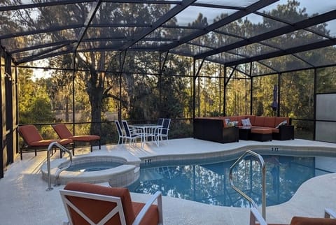 One of Watersong’s largest, most private luxury pool decks with woodland views.