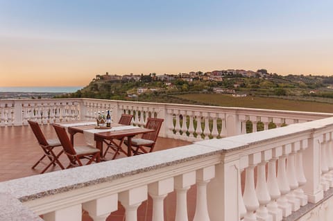 After exploring for the day, come back to an "aperativo" while the sun sets.