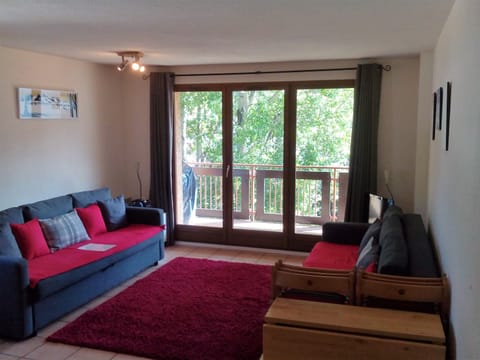 Lounge area looking out onto balcony.