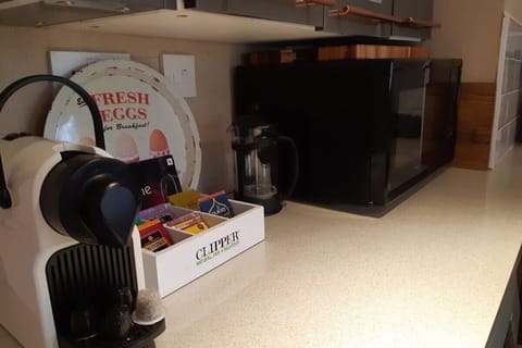 Coffee machine and specialty tea and coffee selection