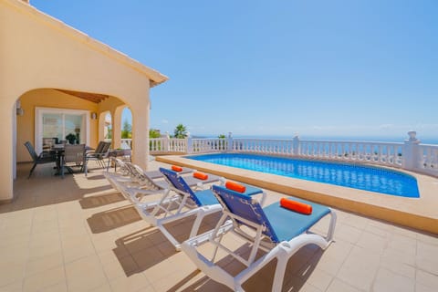 South facing terrace and pool with spectacular sea views