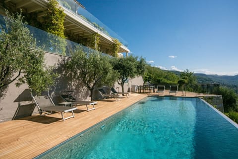 Enjoy lazy days in the sunshine by the infinity pool