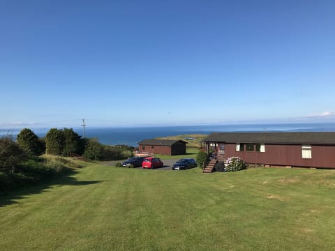 Chalet 12 showing car park and covered veranda
