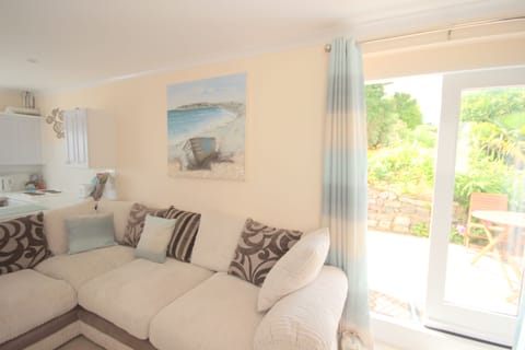 Access to private patio and outdoor dining area from the living area