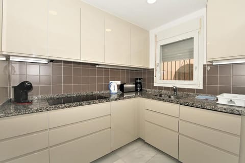 Another view of the modern and spacious kitchen