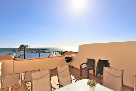 Spacious terrace facing south west with views to the sea and the marina