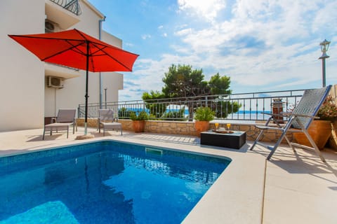 Patio with pool and seaview