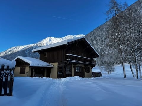 Winter time view of the chalet with its Nordic Bain (hot tub)