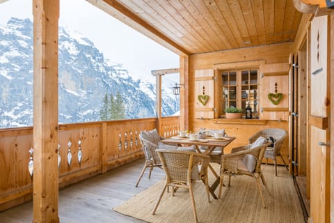 Outside the kitchen you find the perfect breakfast spot enjoying the mountains