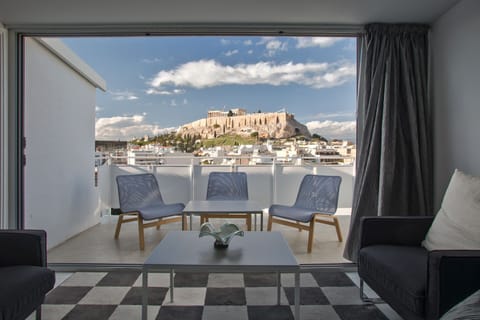 Living room with balcony and panoramic view of the Acropolis