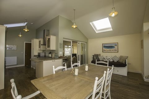 Living area with dining table and day bed