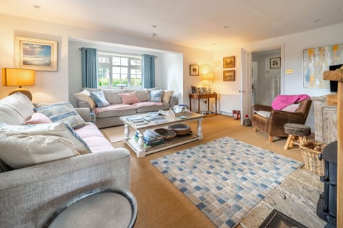 The Potting Shed, Ringstead: Large sitting room with plenty of comfy seating