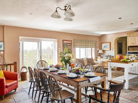 Kitchen has patio door access to 60 foot patio and deck