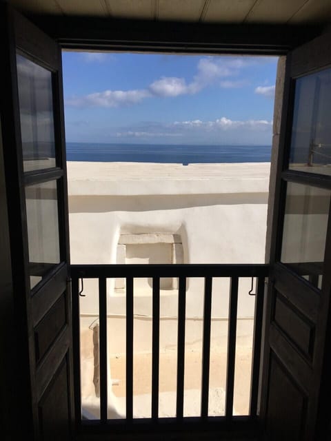 Juliette balcony view towards Mykonos from master bedroom 1