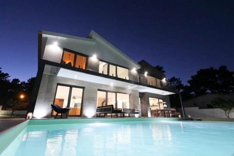 Back Of Casa Marcelo and Pool by night