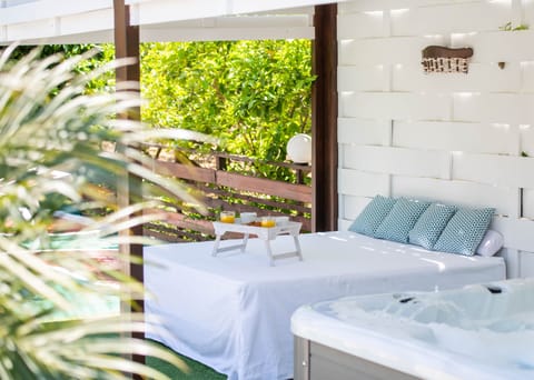 The outdoor heated spa whirlpool is a perfectly sensual space.