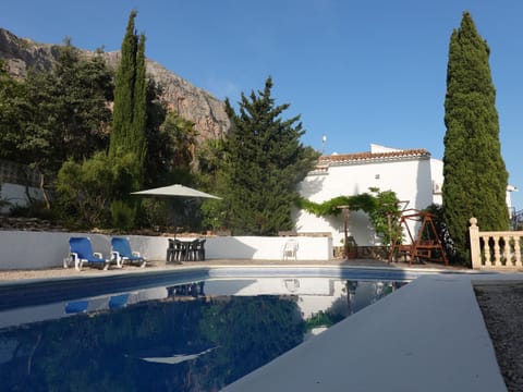 The private swimming pool with Natural Park of Montgo in background
