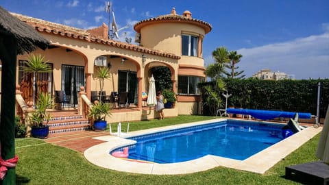 view towards villa gardens and heated swimming pool