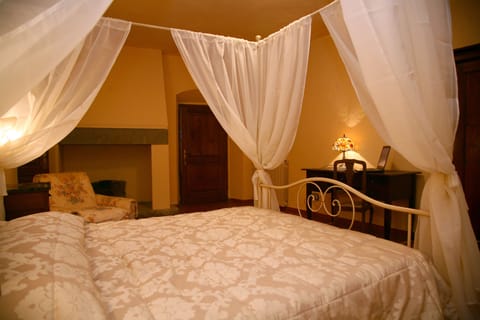 The master bedroom with four-posted bed