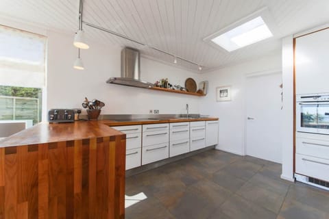 Well equipped kitchen and utility room.
