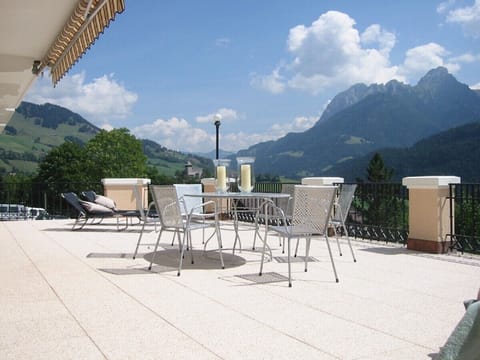 Terrace exclusive to the apartment with panoramic mountain view