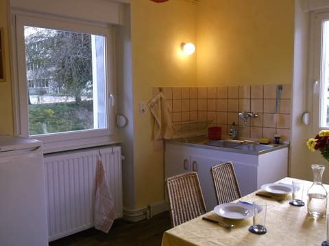 Kitchen, sink and window to the east, in the evening