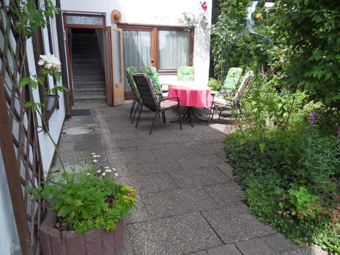 Eastern terrace with entry to the parking area