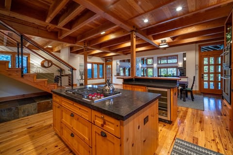 Kitchen looking towards dining table, Great Room and lake