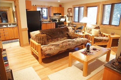 Hardwood Floors, Log Futon, & Granite Counters.