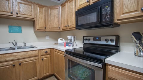 Well stocked kitchen with plenty of pots and pans, food processor, mixer, etc.