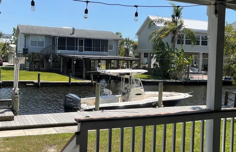 22' center console boat up against the dock for reference.