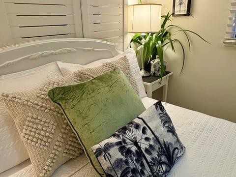 Double bed in its own bedroom, with a large built in wardrobe. 
