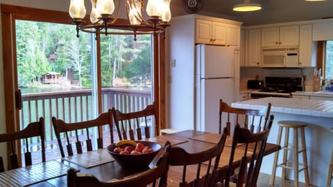 Dining Table, kitchen and the upper level deck