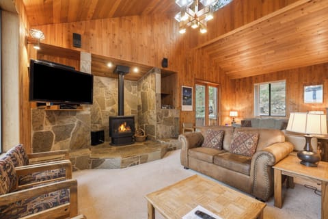 Large living area with gas stove.