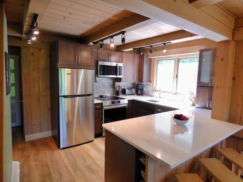 Well laid-out, brand new kitchen that's well-stocked for cooking for a crowd