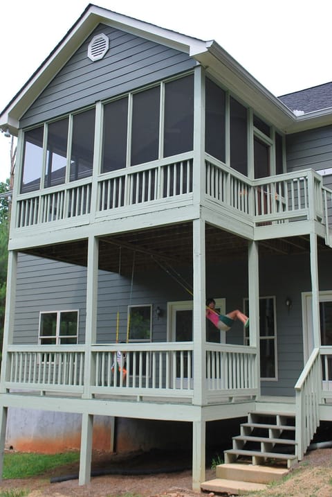 Two porches on back of house for hours of outdoor enjoyment! Upstairs screened.